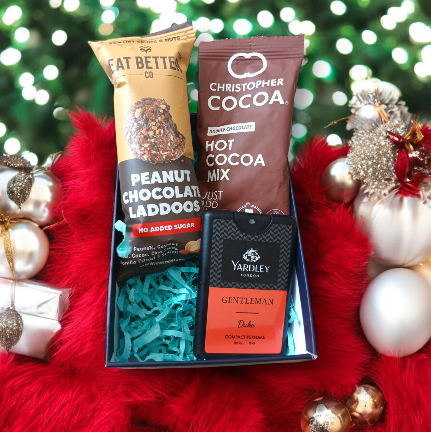 Mini hamper with hot cocoa, men's pocket perfume and chocolate peanut laddoo