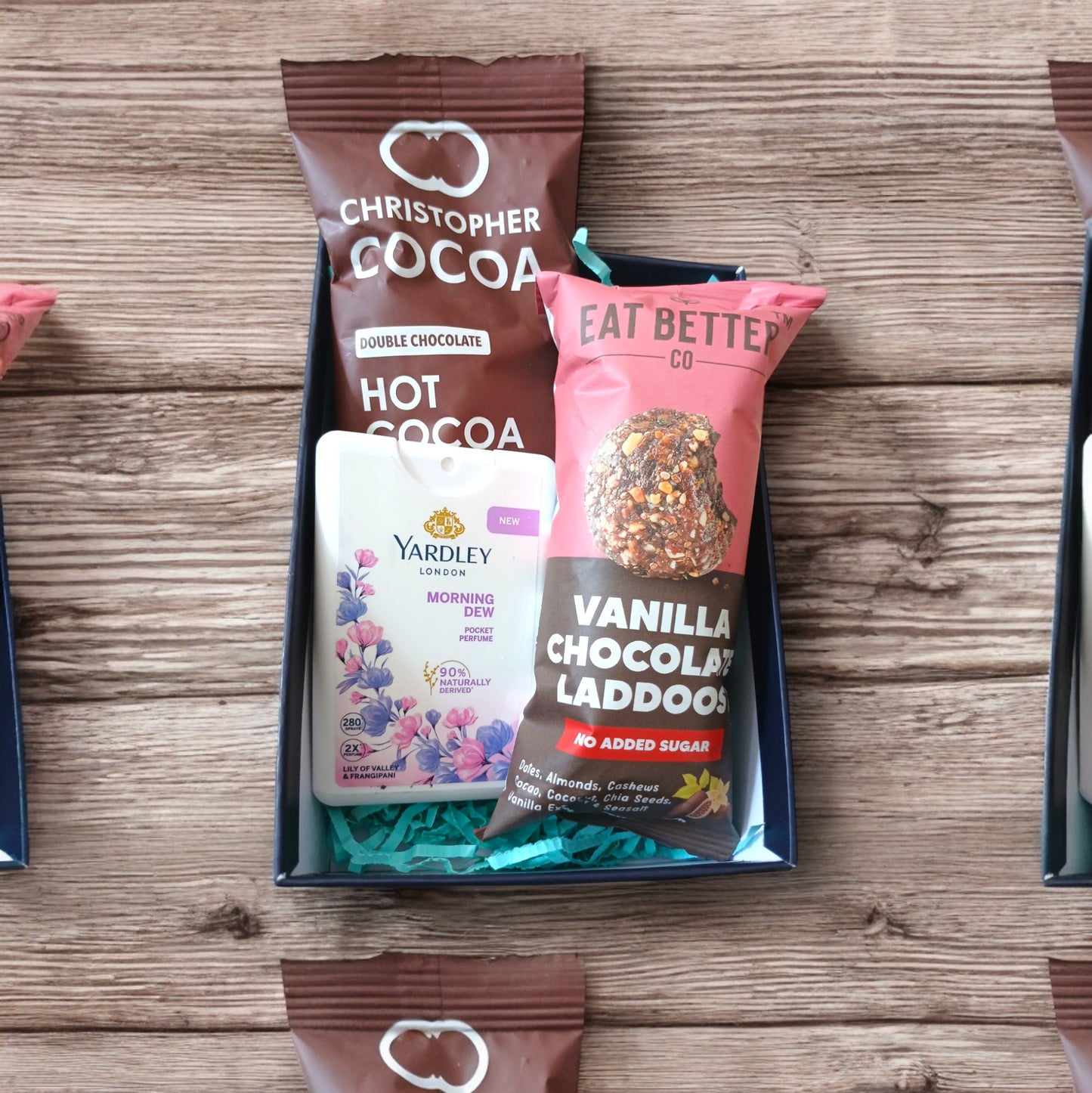 Mini hamper with hot cocoa, women's pocket perfume and chocolate vanilla laddoo