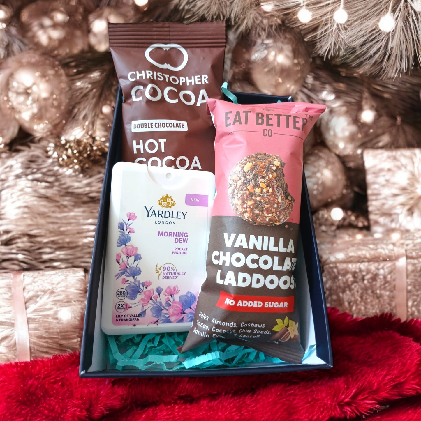 Mini hamper with hot cocoa, women's pocket perfume and chocolate vanilla laddoo