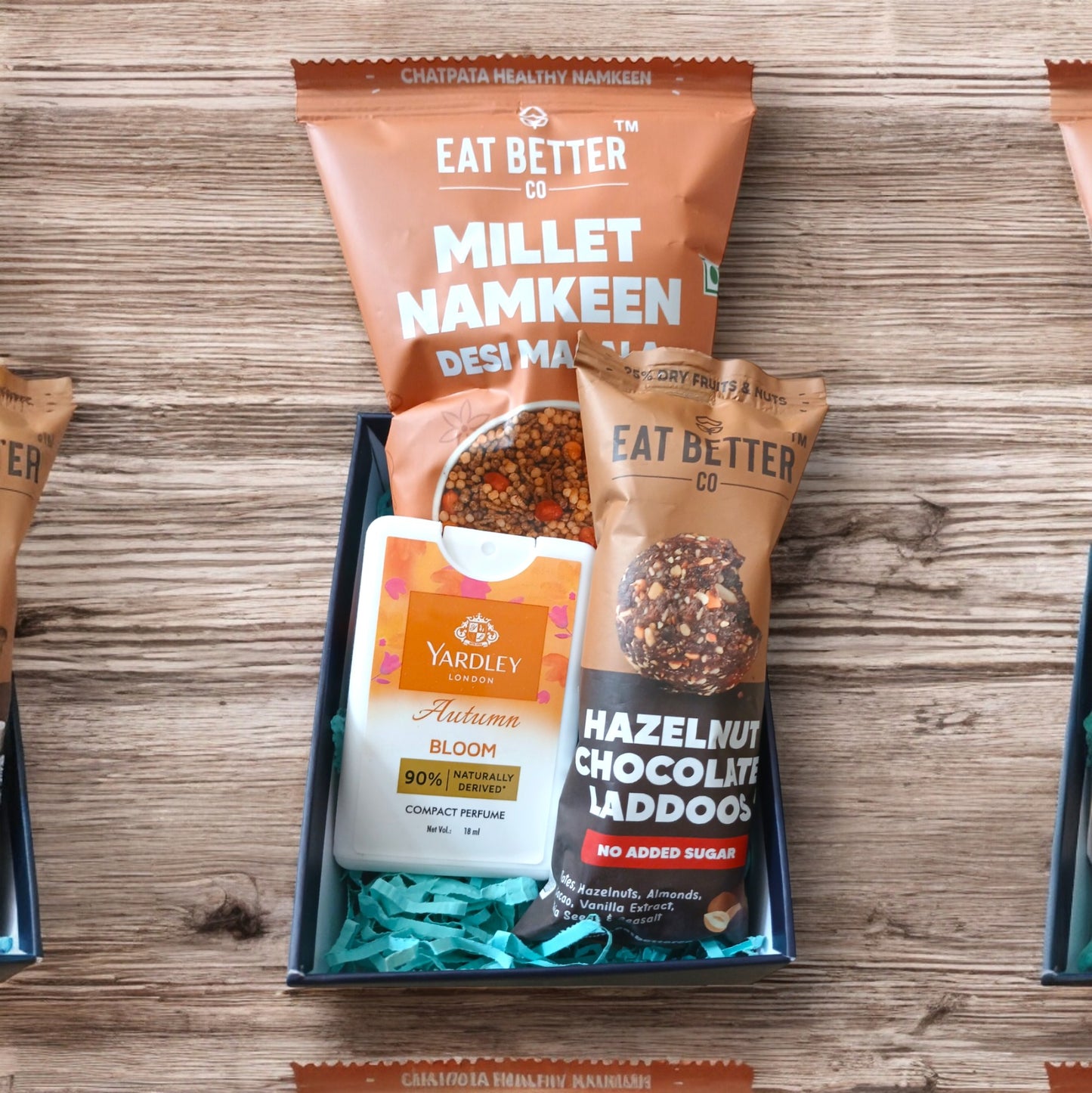 Mini hamper with Millet Namkeen, women's pocket perfume and chocolate hazelnut laddoo