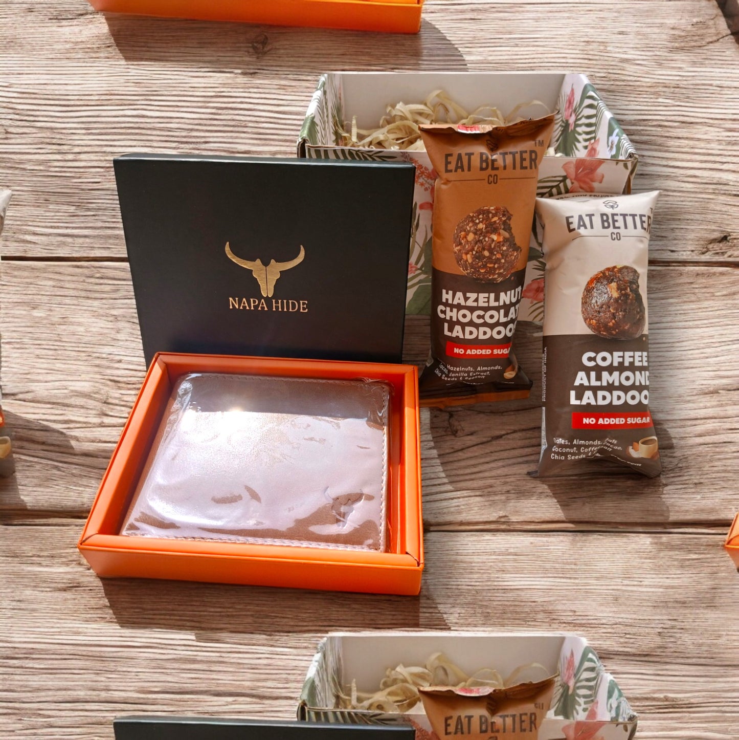 Mini gift box with men's wallet and two healthy snack packs